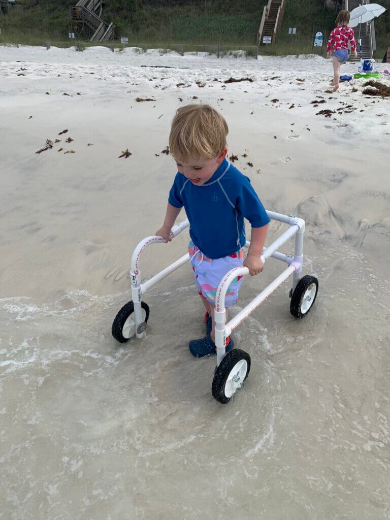 Toddler Boy with Beach Walker